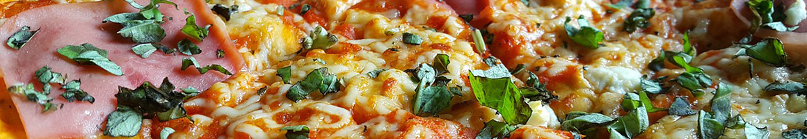 Eating Italian Pizza at Pizza House restaurant in Ann Arbor, MI.